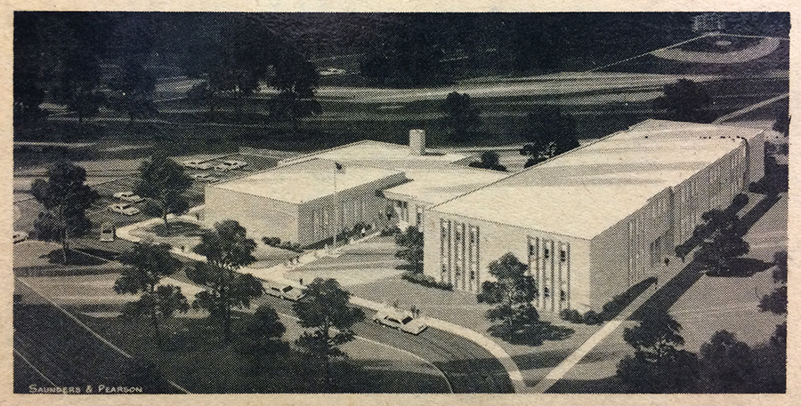 Black and white concept artwork of Rolling Valley Elementary School by architects Saunders and Pearson. The building is pictured from an aerial vantage point, overlooking the main entrance and front driveway loop. A baseball field is visible in the distance. The architects designed Rolling Valley with a two-story classroom wing to keep as much open-space as possible on the school grounds. 