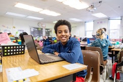 student using a laptop