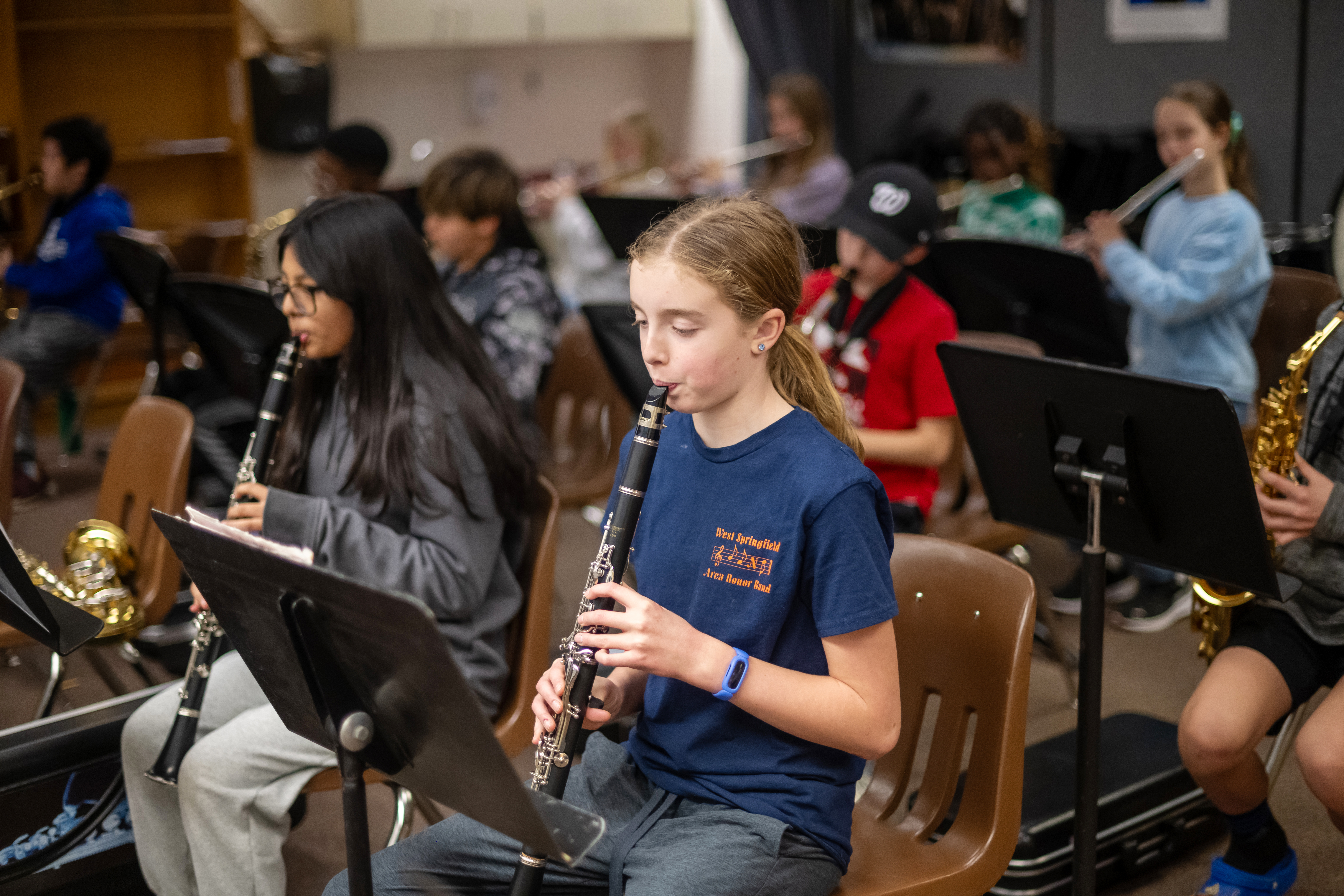 student playing in the band